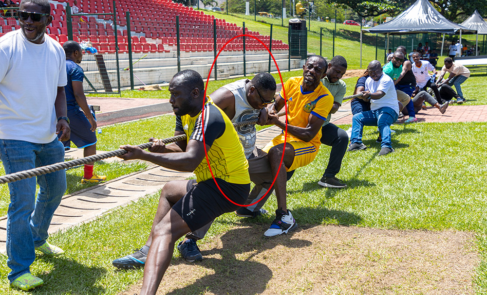 Prof. Emmanuel Adu Amankwah used a body-clamp grip, 